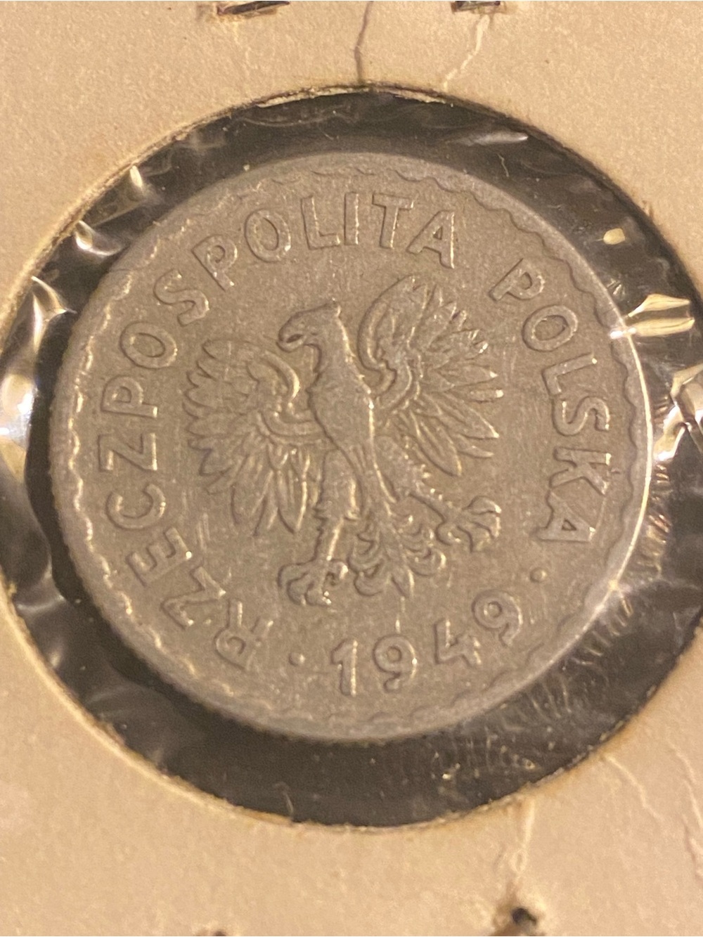 1949 Polish 20 Groszy piece, featuring a crowned eagle emblem.